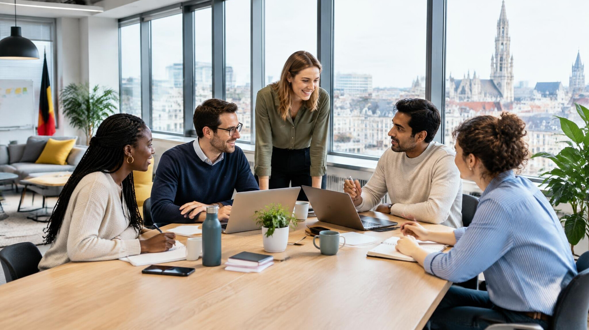 Group of professionals collaborating in a modern Belgian office