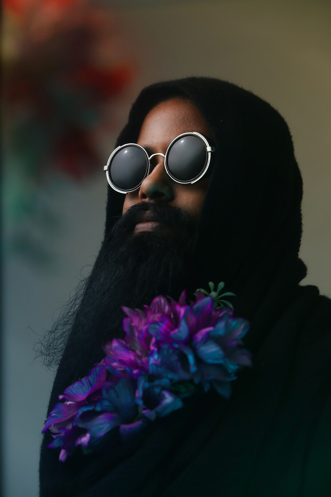 Portrait of a man with beard and glasses