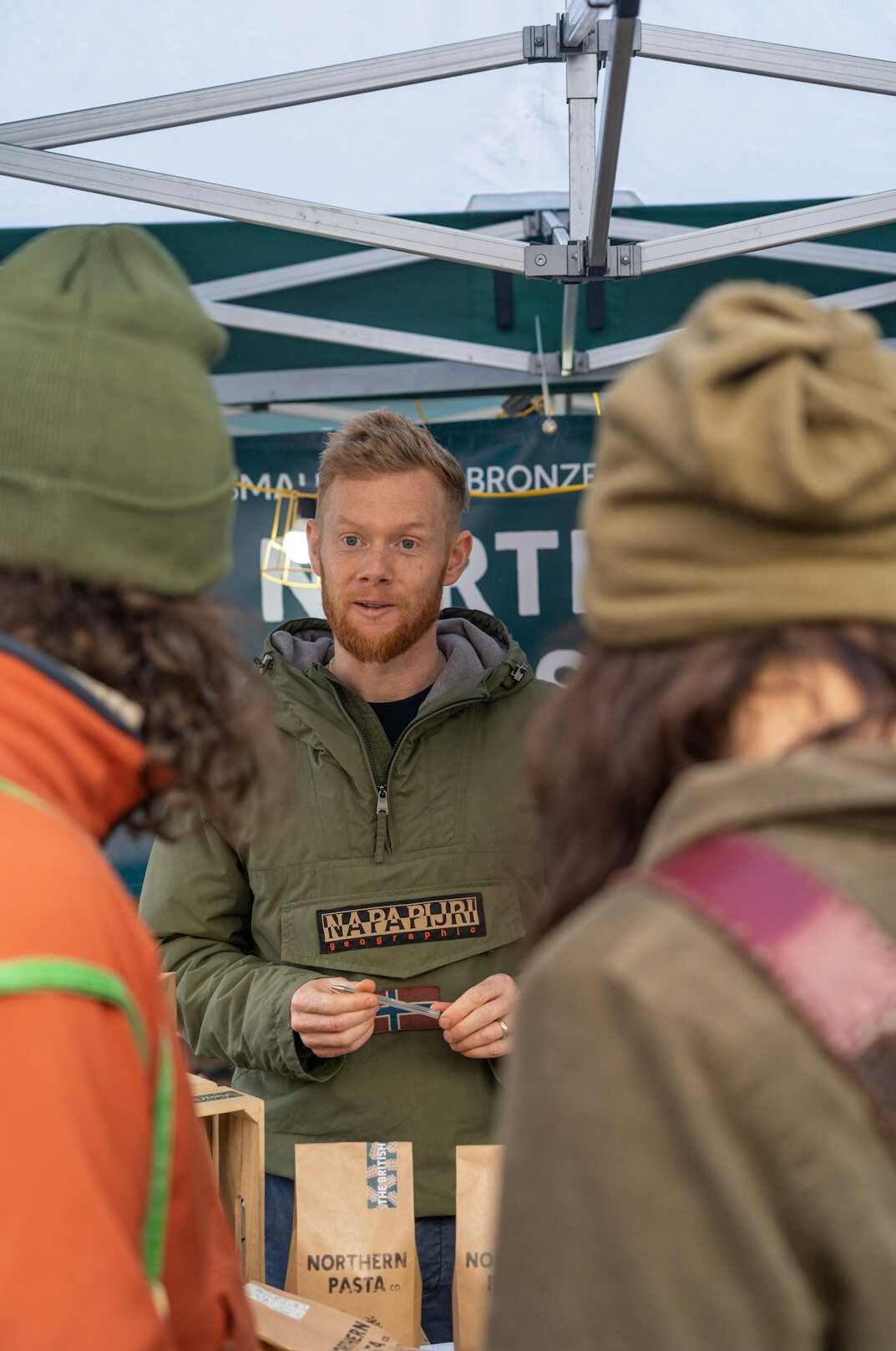Manager presenting to a small team